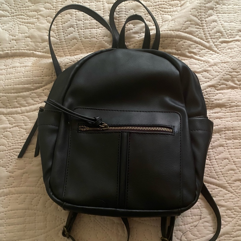 Black mini backpack.